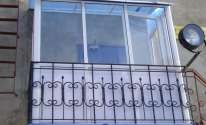 Остекление балконов алюминиевыми рамами с окнами УралБалкон
